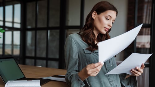 woman reviewing documents